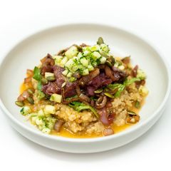 A picture of Tuna Poke Bowl with Caramelized Shallots and Rosé Vinaigrette.