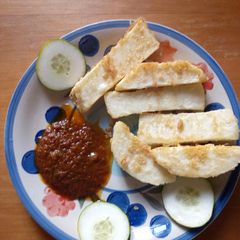 A picture of Fried yam with coated egg.