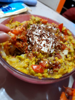 Una foto de Nachos express con guacamole