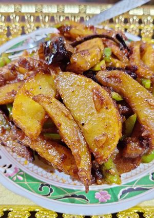 A picture of Chilli potato wedges.