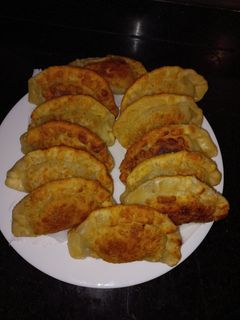 Una foto de Empanadas fritas de carne mechada