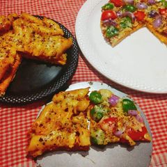 A picture of Veg cheese Pasta Pizza.