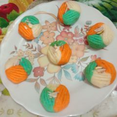A picture of Super healthy tasty tri color designer ladoo.