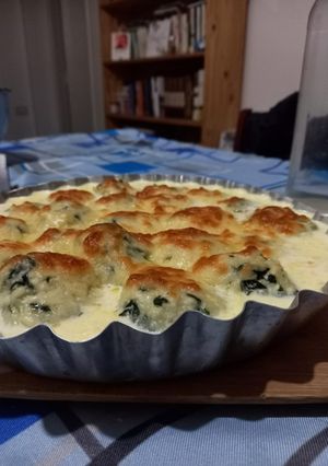 Una foto de Malfattis de espinaca gratinado