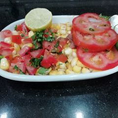 A picture of Corn tomato Chaat.