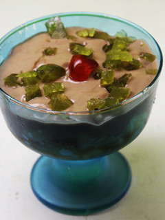 Una foto de Copa de plátano y kiwi con yogurt de chocolate