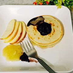 Apple Pancake With Mulberry Topping A picture of Apple Pancake With Mulberry Topping.
