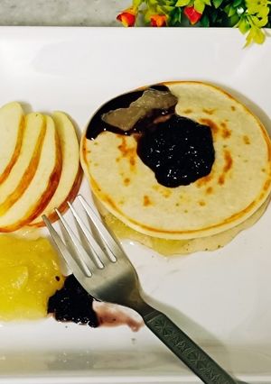 A picture of Apple Pancake With Mulberry Topping.