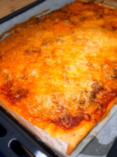 Una foto de Pizza de atún y merluza