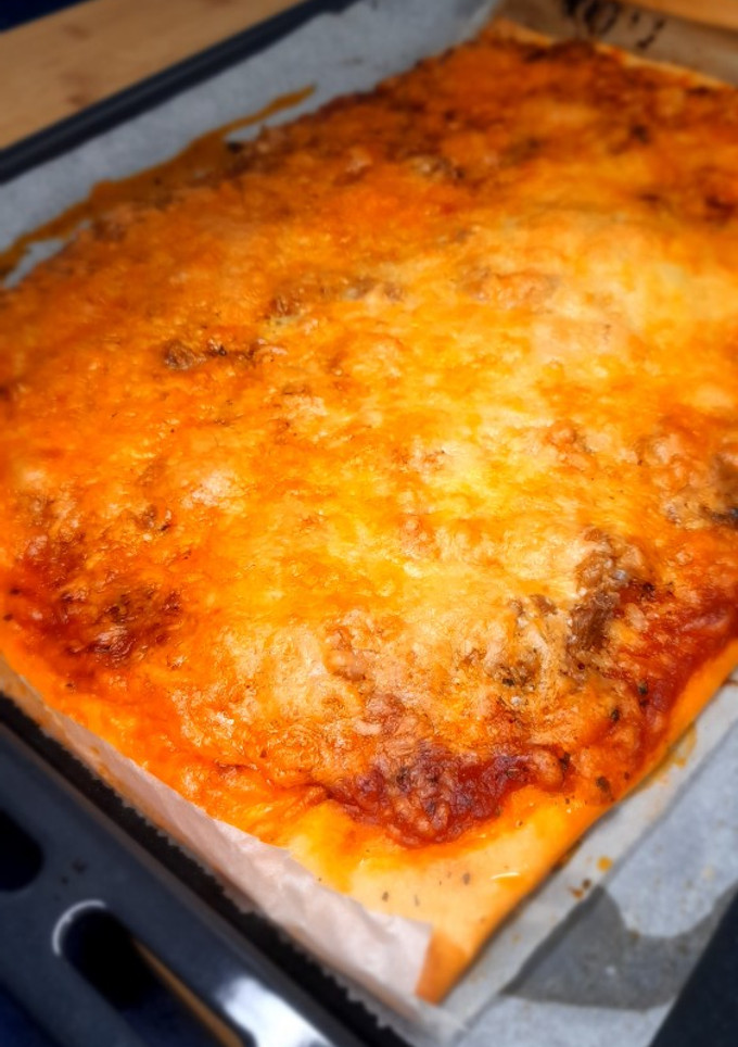 Una foto de Pizza de atún y merluza