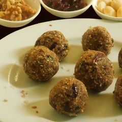 A picture of Laddu with Dry Fruits and seeds.