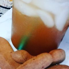 A picture of Tamarind water. Tamarindo agua fresca.