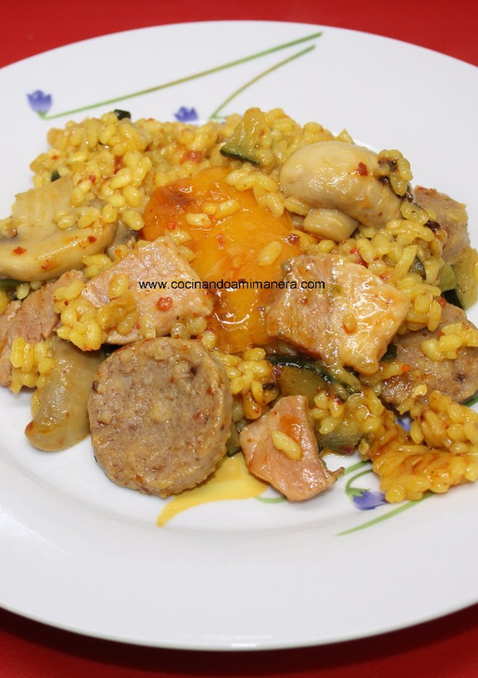Una foto de Arroz con lomo y champiñones