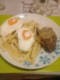 Una foto de Bistec a lo pobre de mamita