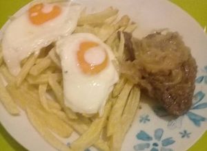 Una foto de Bistec a lo pobre de mamita