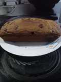 Torta de avena con gotas de chocolate y jugo de piña