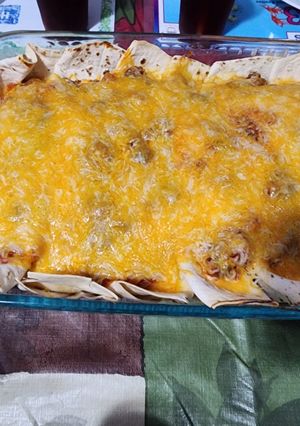 A picture of Cheese N Chicken Enchiladas.