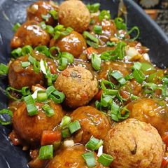 A picture of Egg Balls In Manchurian Gravy.