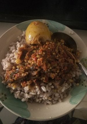 A picture of Ofada rice and stew.