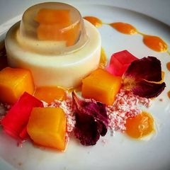 A picture of Mango and Raspberry Panna cotta.