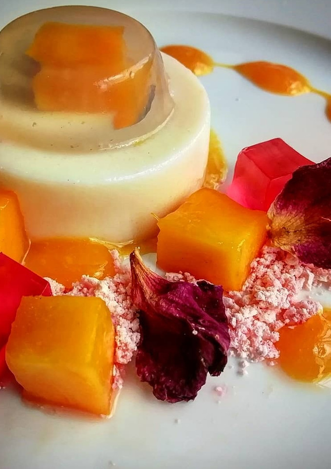 A picture of Mango and Raspberry Panna cotta.