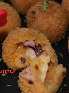 Una foto de Croquetas de pulpo a la gallega