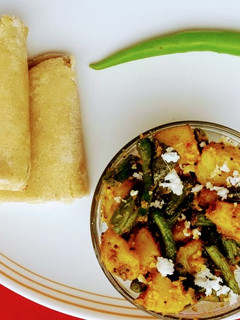 A picture of Potato beans coconut sabzi.
