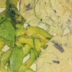 A picture of Fried eggs and butter glazed avocado #ketomeals.