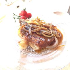 A picture of Pork Chop With Onion Black Pepper Sauce.
