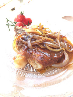 A picture of Pork Chop With Onion Black Pepper Sauce.