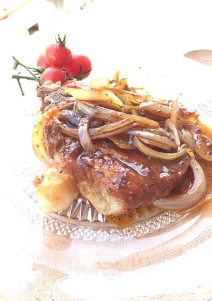 A picture of Pork Chop With Onion Black Pepper Sauce.