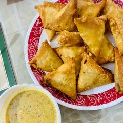 A picture of Triangle mince samosa.