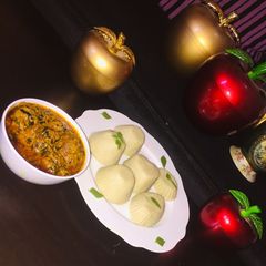 Pounded yam and egusi soup A picture of Pounded yam and egusi soup.