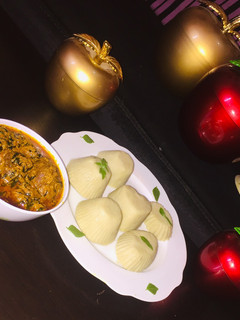 A picture of Pounded yam and egusi soup.