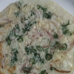 A picture of Cheese Onion Uttapam.