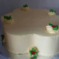 A picture of Butter scrotch with cherris cake.