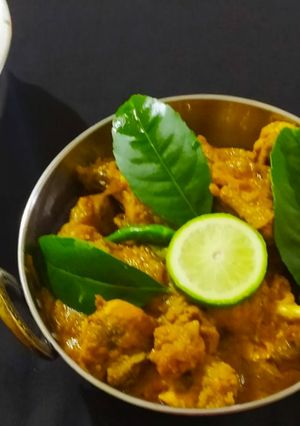 A picture of Gandhoraj Chicken/Murgi(Kaffir Lime flavoured Chicken Curry).