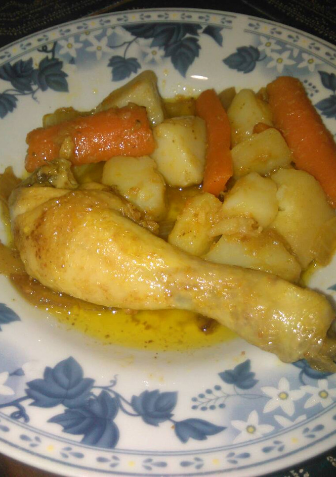 Una foto de Pollo con patatas y zanahoria