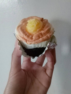 A picture of Moist Chocolate Cupcake Topped with Brazo de Mercedes.