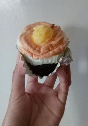 A picture of Moist Chocolate Cupcake Topped with Brazo de Mercedes.