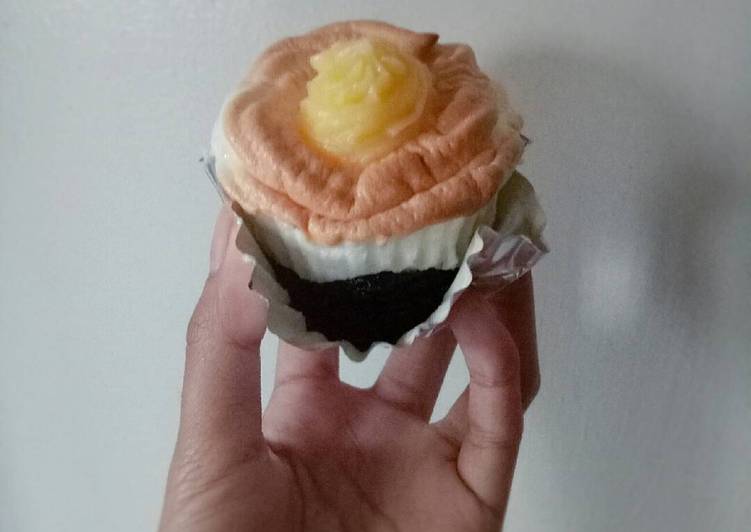 Moist Chocolate Cupcake Topped With Brazo De Mercedes Recipe By Margaux Lawas Cookpad