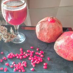 A picture of Pomegranate and Apple juice.