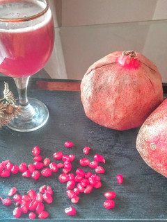 A picture of Pomegranate and Apple juice.