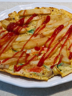 A picture of Omelette (chips-egg omelette).