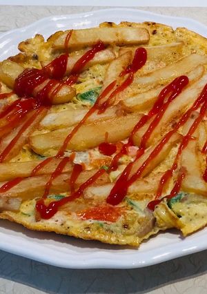 A picture of Omelette (chips-egg omelette).