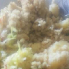 A picture of Rice mixed with potatoes.
