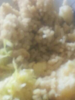 A picture of Rice mixed with potatoes.