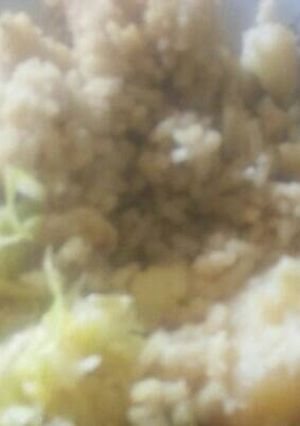 A picture of Rice mixed with potatoes.