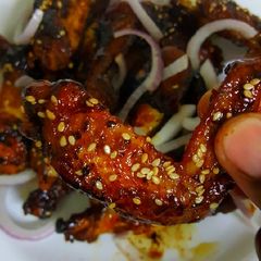 A picture of Honey Garlic Sticky Wings.