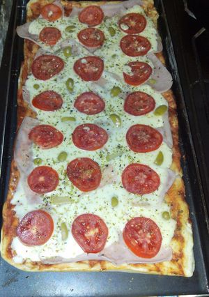Una foto de Pizza a la planchetta